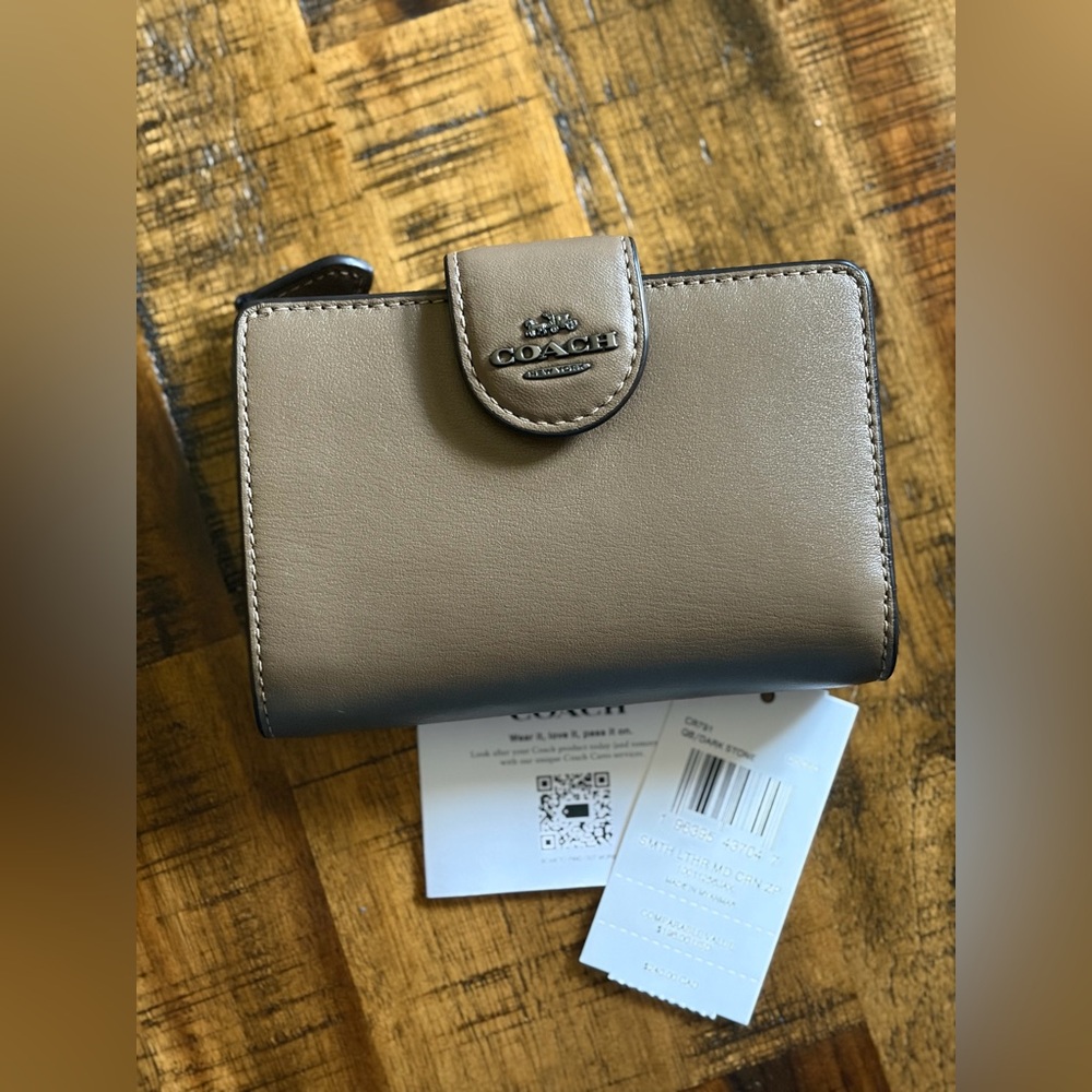 Coach smooth refined calf leather corner zip wallet in dark stone & gunmetal.